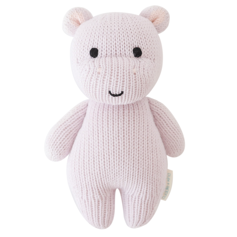 Hand-knit lavender baby hippo plush toy shown in front flatlay view, made with 100% cotton yarn by Cuddle + Kind