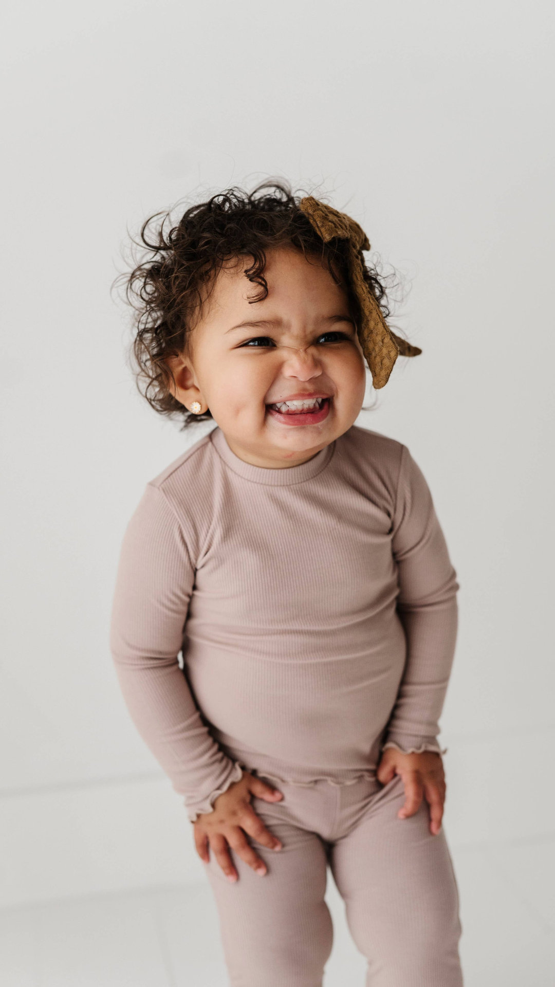 Close-up of soft, stretchy bamboo ribbed long sleeve tee in lilac with lettuce hem detail, perfect for toddlers’ comfort and mobility