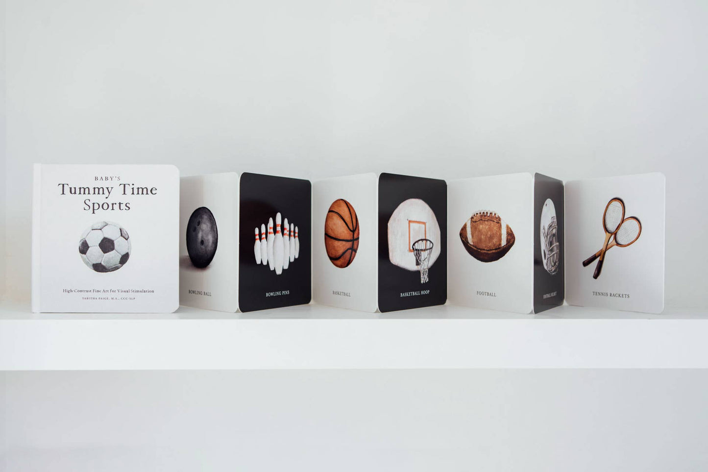 Accordion board book Baby's Tummy Time Sports standing upright on display