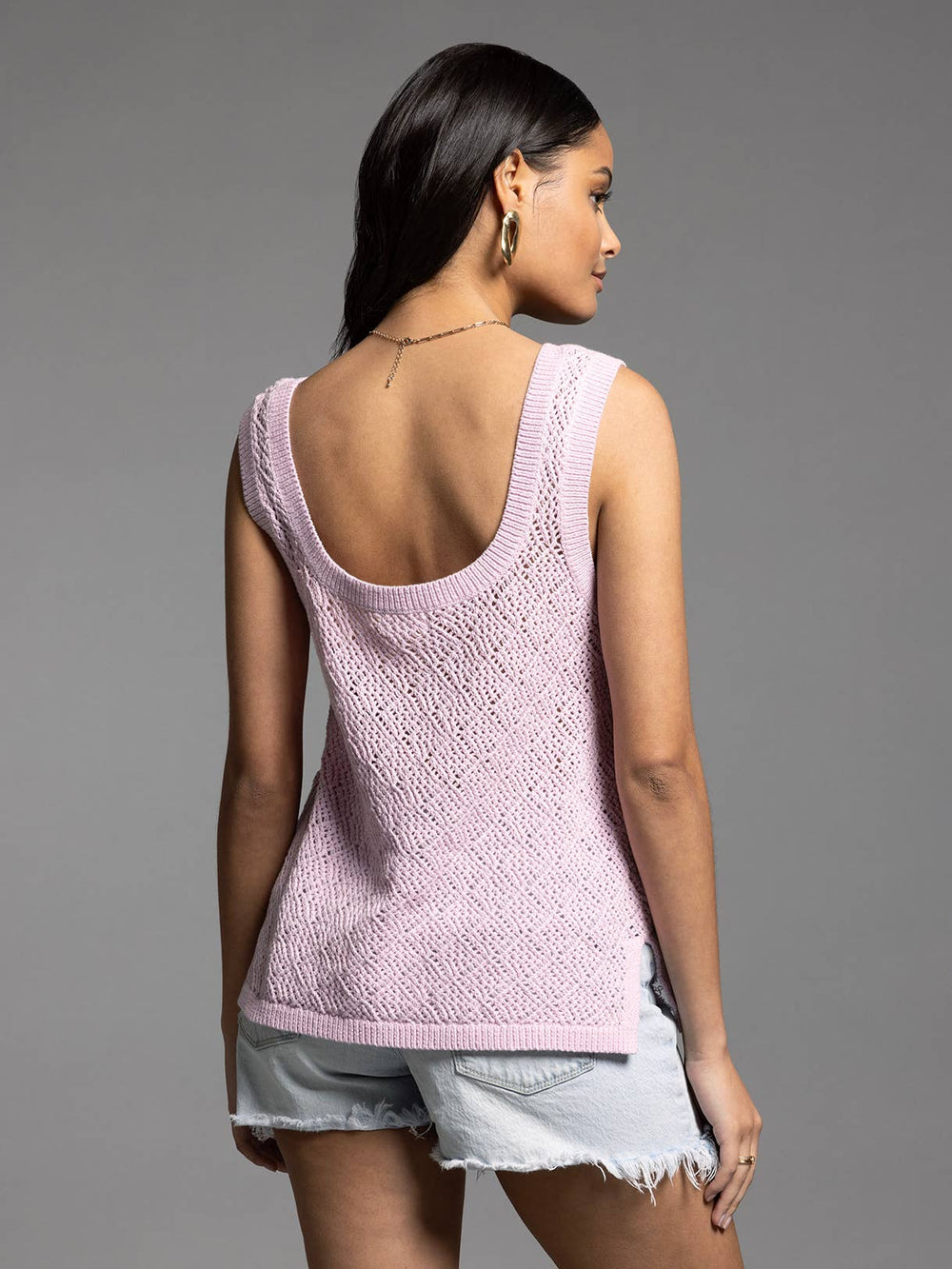 Back view of model wearing Bailey Square Neck Knit Top in lilac paired with shorts, showcasing fitted silhouette
