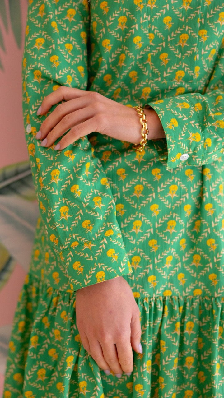 Close-up of the Swiss cuff on the tropical trellis Beaux Dress, highlighting its refined design and high-quality cotton fabric.