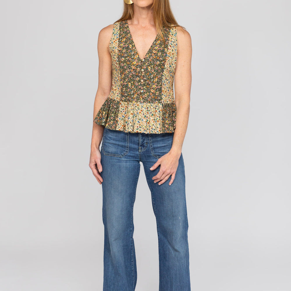 Front view of the Beck Peplum Top in floral cotton with peplum hem.
