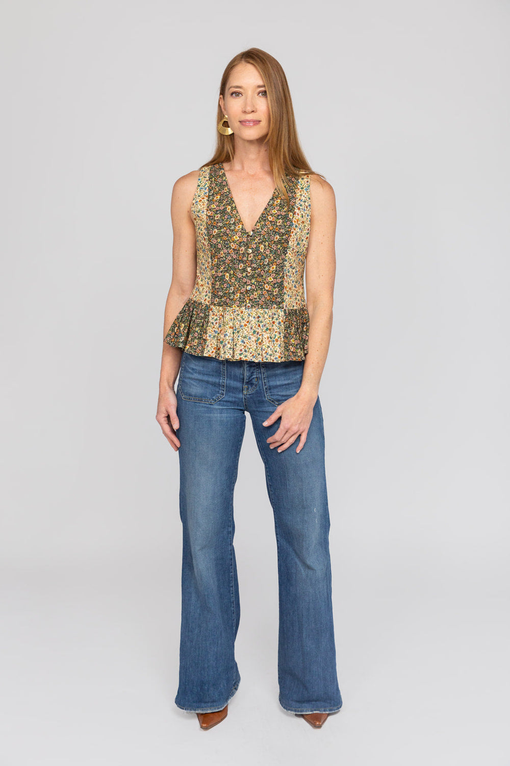 Front view of the Beck Peplum Top in floral cotton with peplum hem.