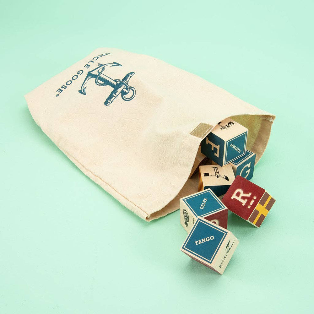 
                      
                        Uncle Goose Nautical Alphabet Blocks with Canvas Anchor Bag – Wooden Learning & Décor Set
                      
                    