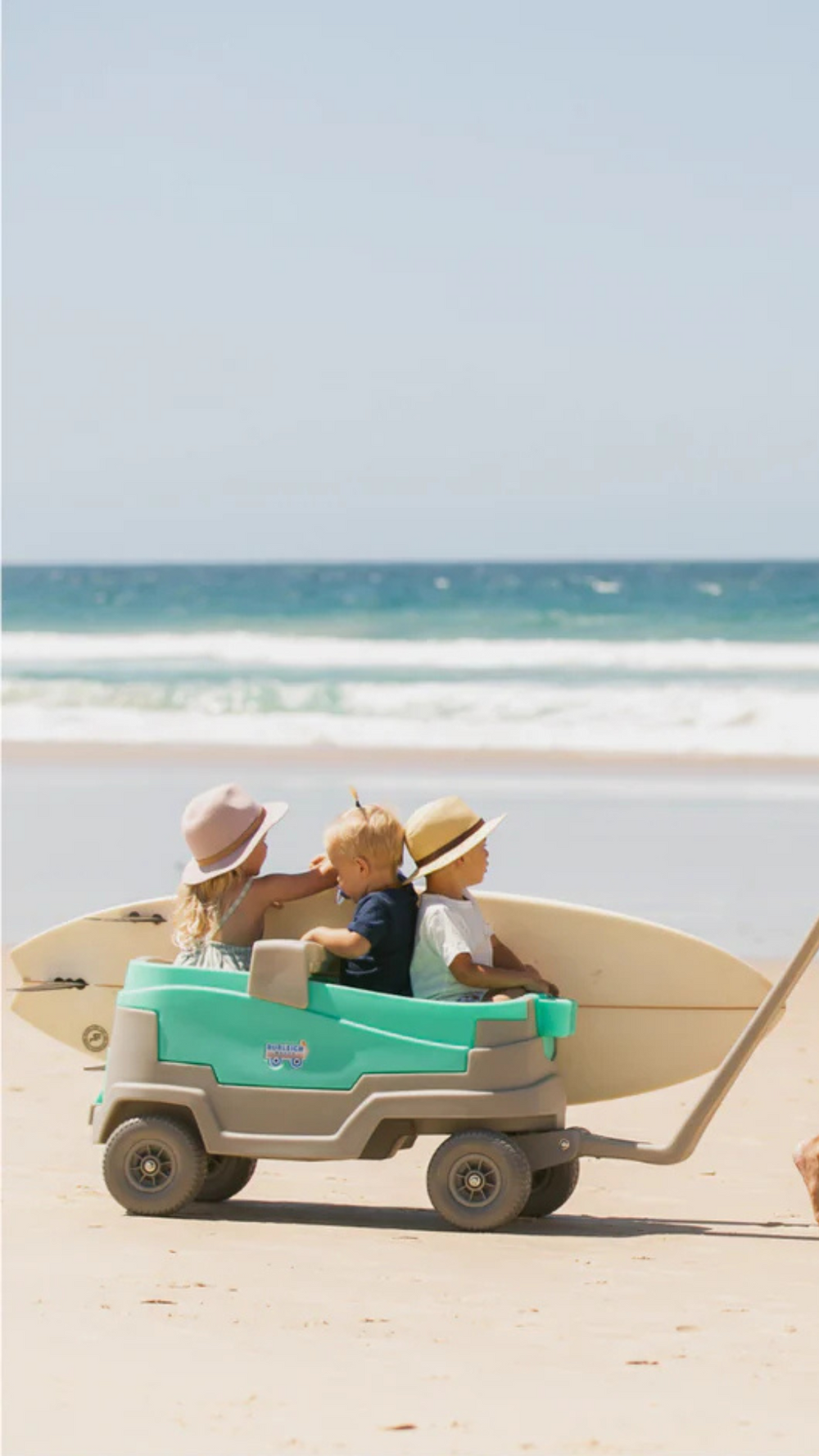 Side view of the Burleigh Wagon Kids Stroller & Beach Wagon with attached cooler, perfect for beach outings and family adventures.