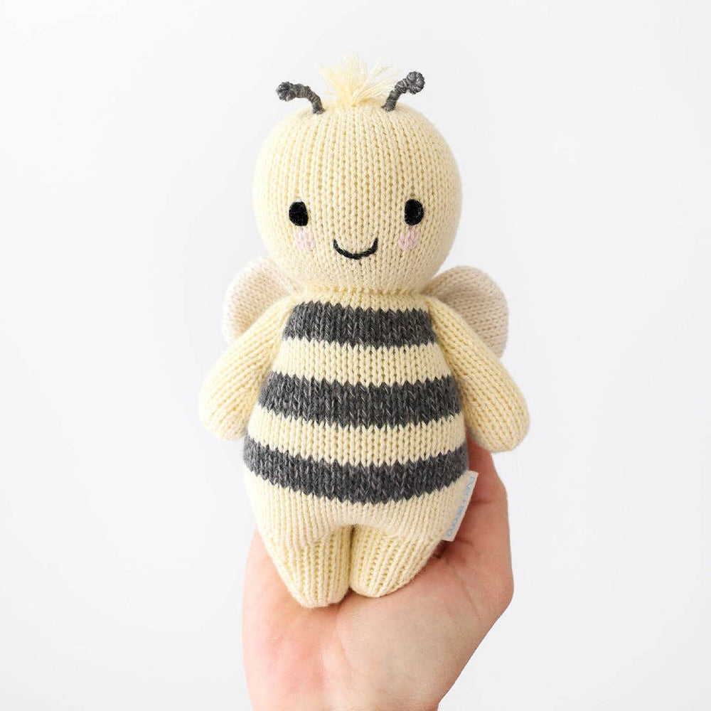 
                      
                        Cuddle + Kind Baby Bee – Hand-Knit Cotton Doll That Gives 5 Meals | Fair Trade Heirloom Toy
                      
                    