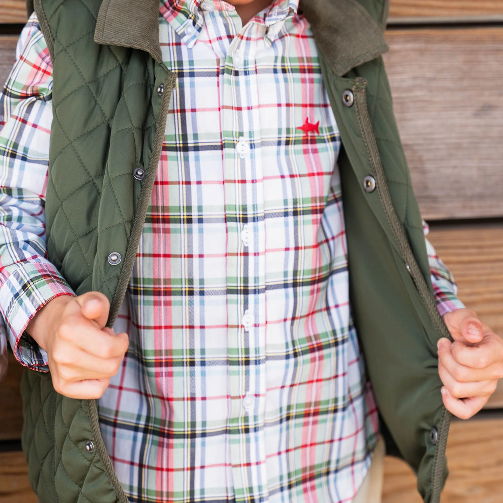 
                      
                        Young boy wearing Carter Oxford Shirt layered with vest, showing stylish layering, warmth, and classic creme plaid design.
                      
                    