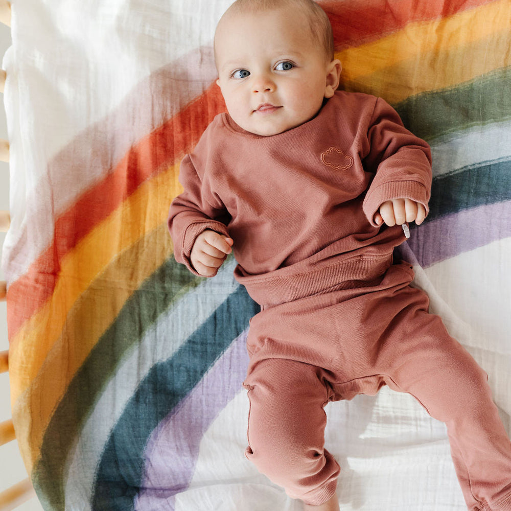 
                      
                        Rainbow Connection Swaddle
                      
                    