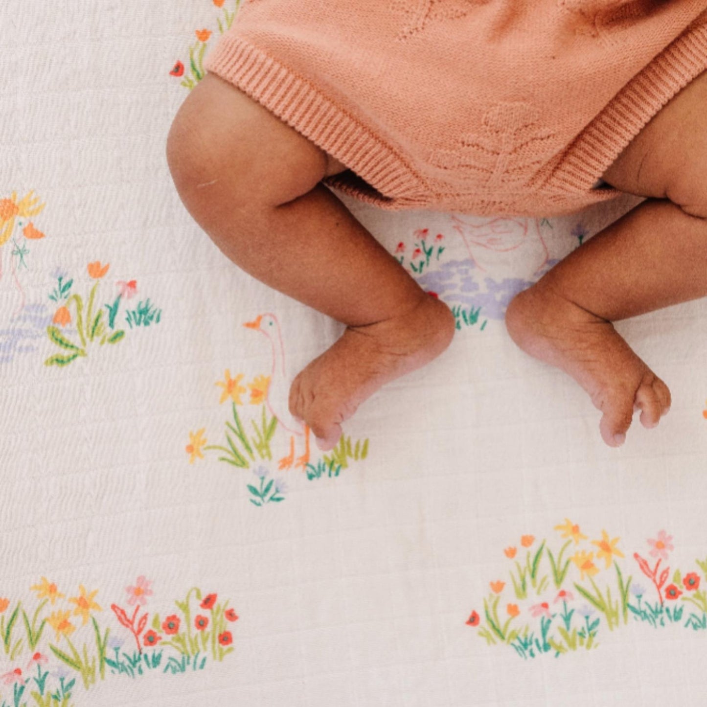 Close-up of soft cotton muslin texture on Garden Goose Crib Sheet