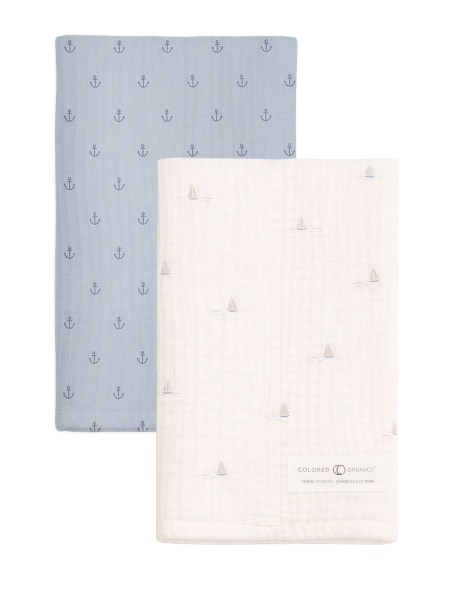 Flat lay of Colored Organics 2-Pack Burp Cloths — Marina sailboat and Anchor print side by side