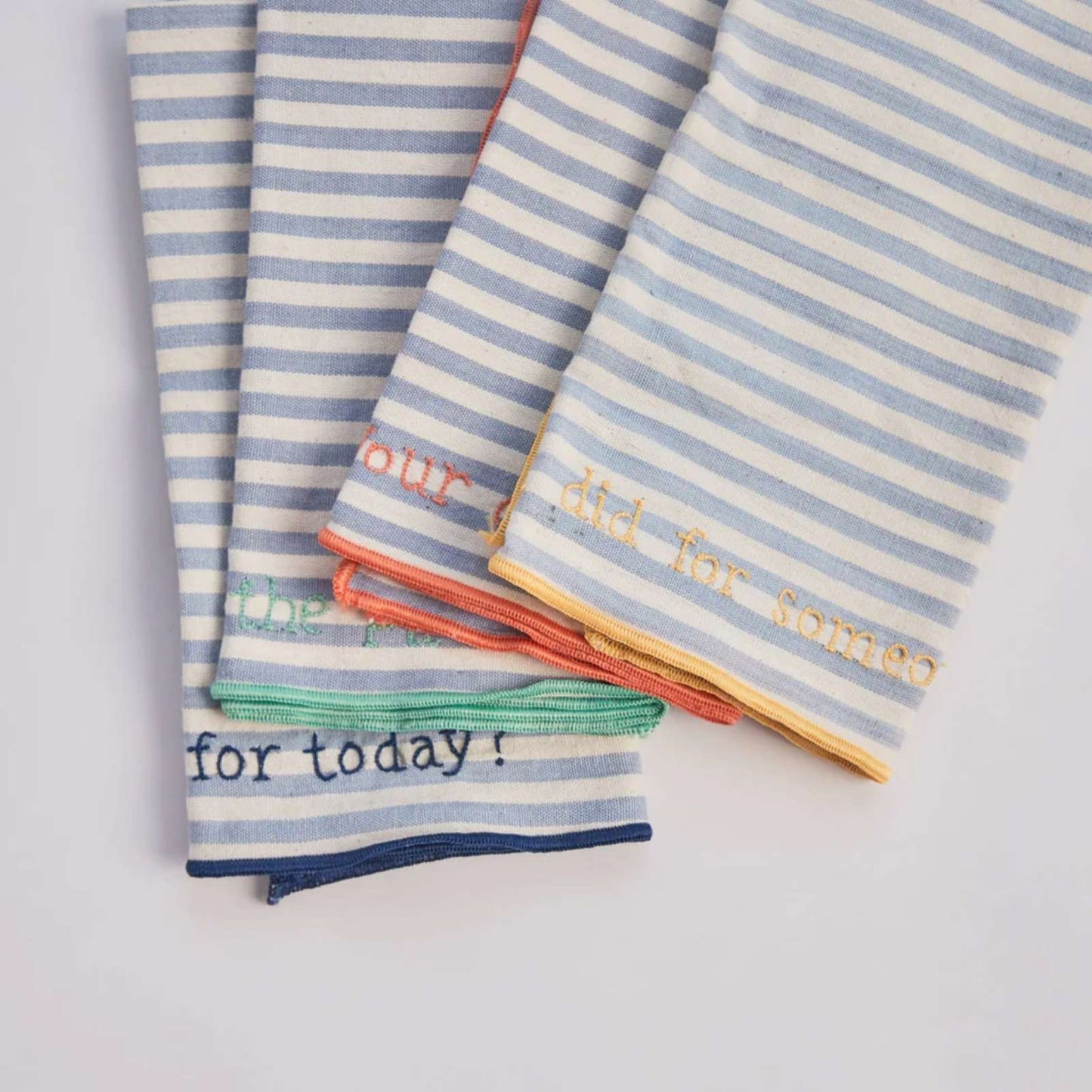 Embroidered Conversation Starter Striped Dinner Napkins in a colorful set of 4.