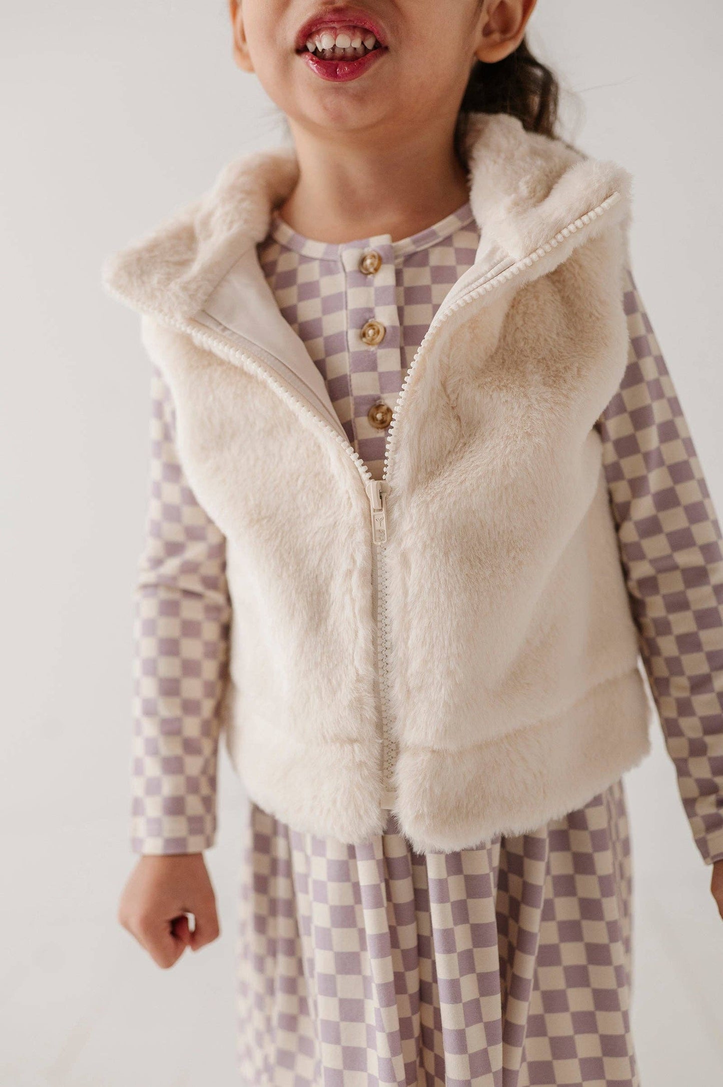 Front view of Cozy Faux Fur Vest for babies & toddlers in neutral tone, open-front design, and soft texture