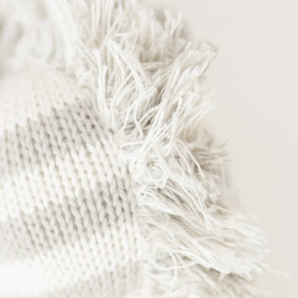 
                      
                        Close-up detail of Cuddle + Kind Baby Zebra’s hand-knit black and white mane showing heirloom craftsmanship
                      
                    