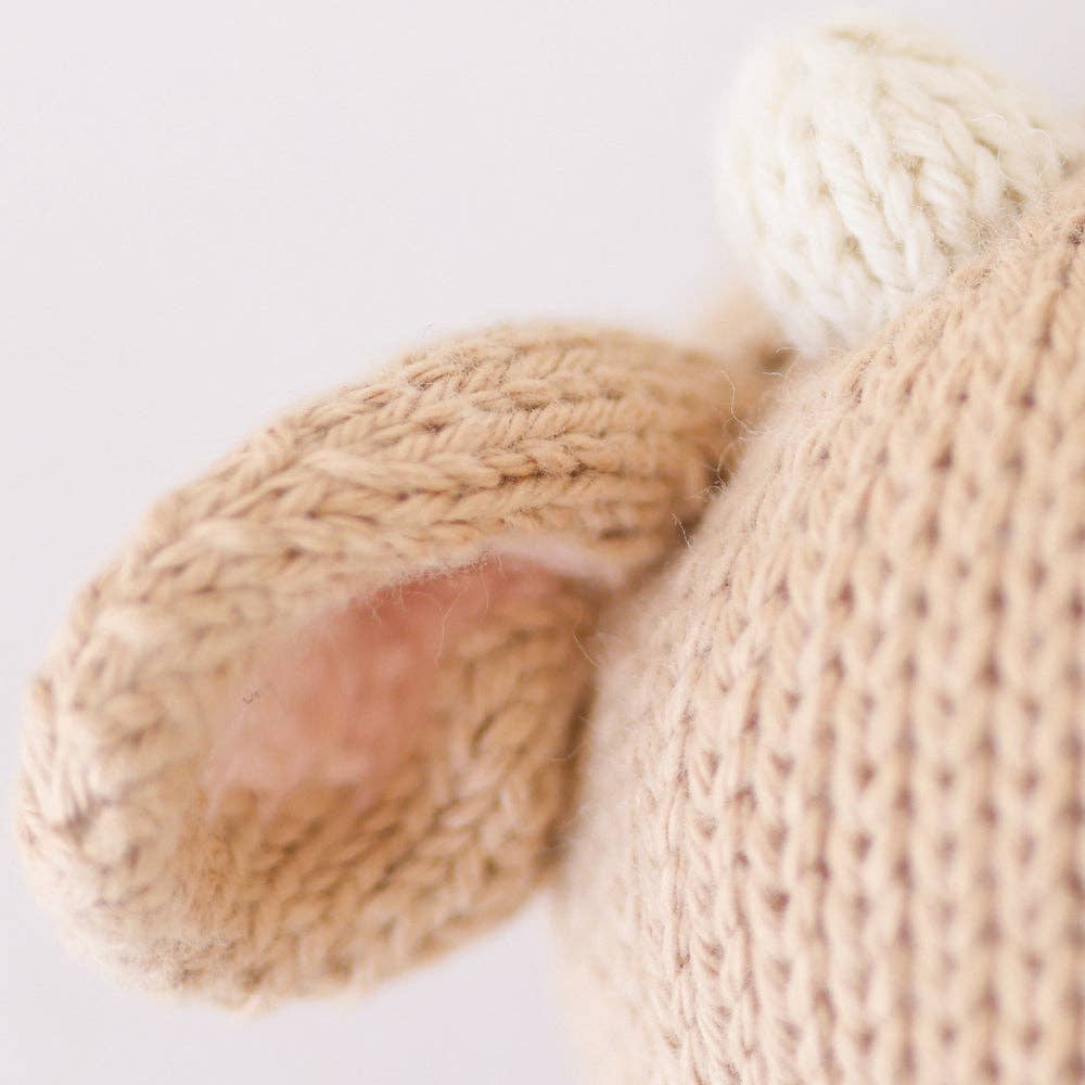
                      
                        Close-up of Cuddle + Kind Baby Cow (Jersey) ear highlighting detailed hand-knit texture and OEKO-TEX certified cotton yarn
                      
                    