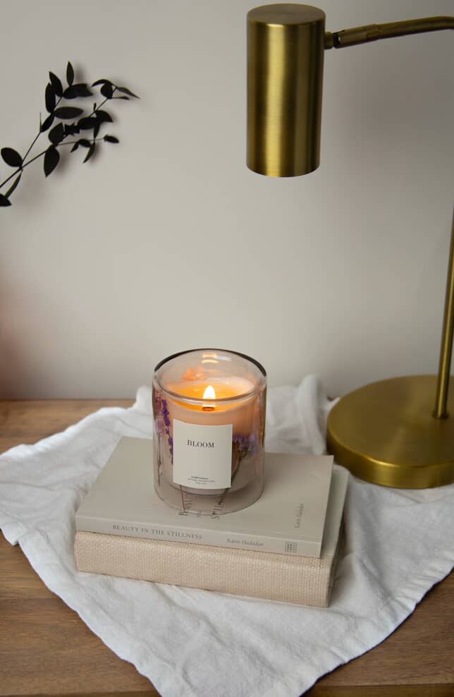 
                      
                        Personalized handmade candle decorated with dried flowers during Grace & Haven’s Essex CT candle making event.
                      
                    