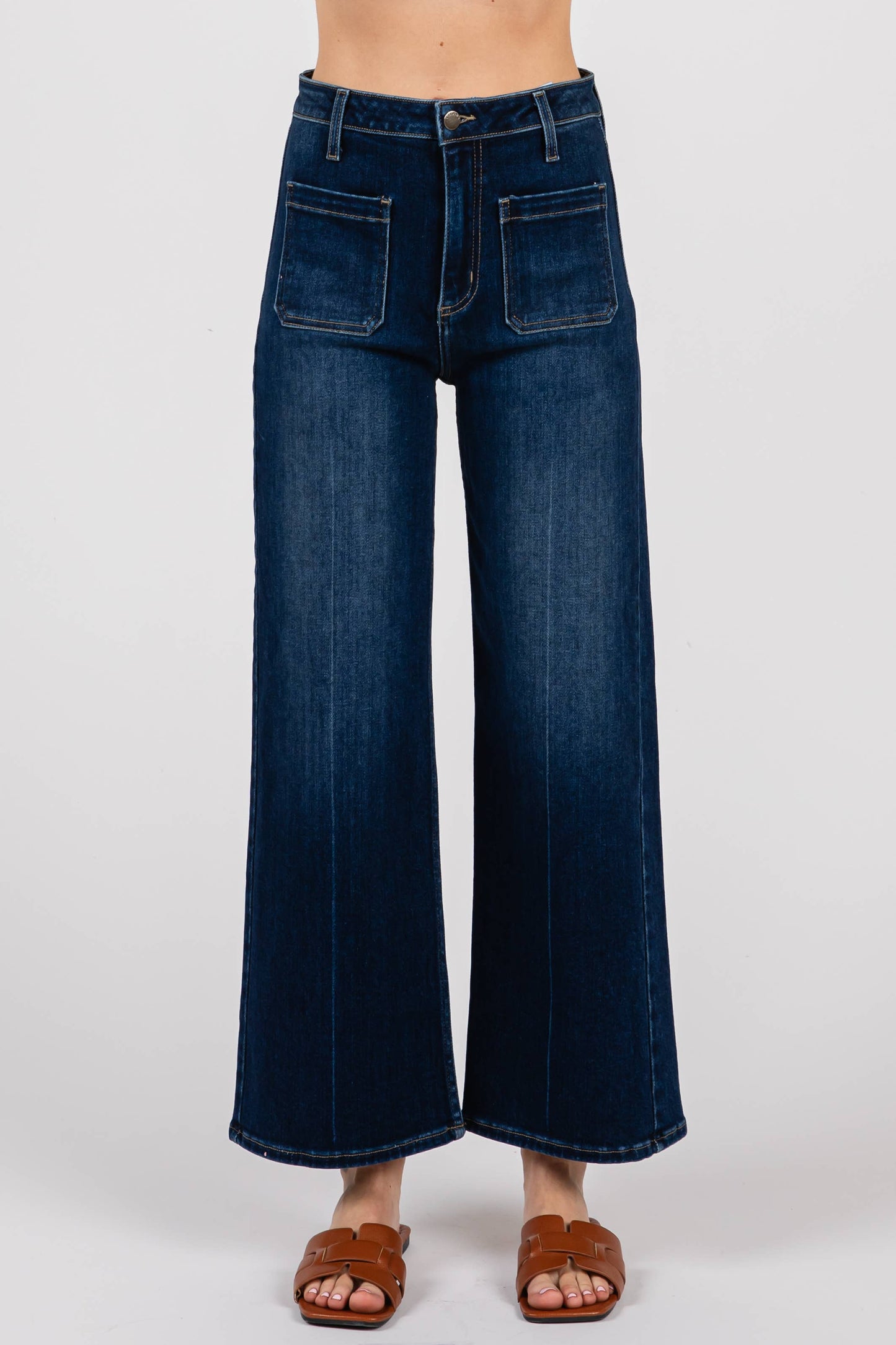 Close-up of Dark Sailor Jeans front view highlighting sailor-style patch pockets, dark wash finish, and tailored wide leg design.