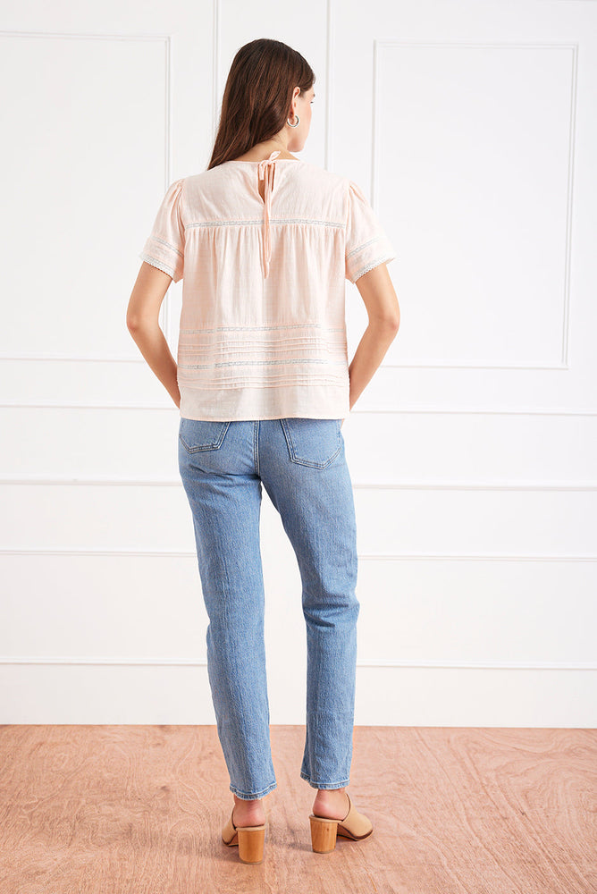 
                      
                        Back studio view of the Dawn Tee, showcasing its clean lines, relaxed fit, and airy cotton texture.
                      
                    