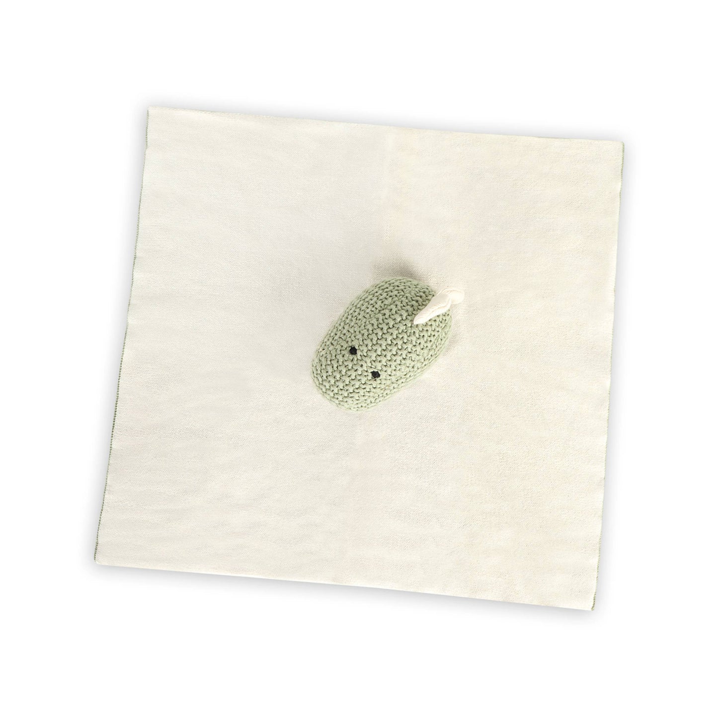 Close-up of organic cotton sweater knit dinosaur baby lovey