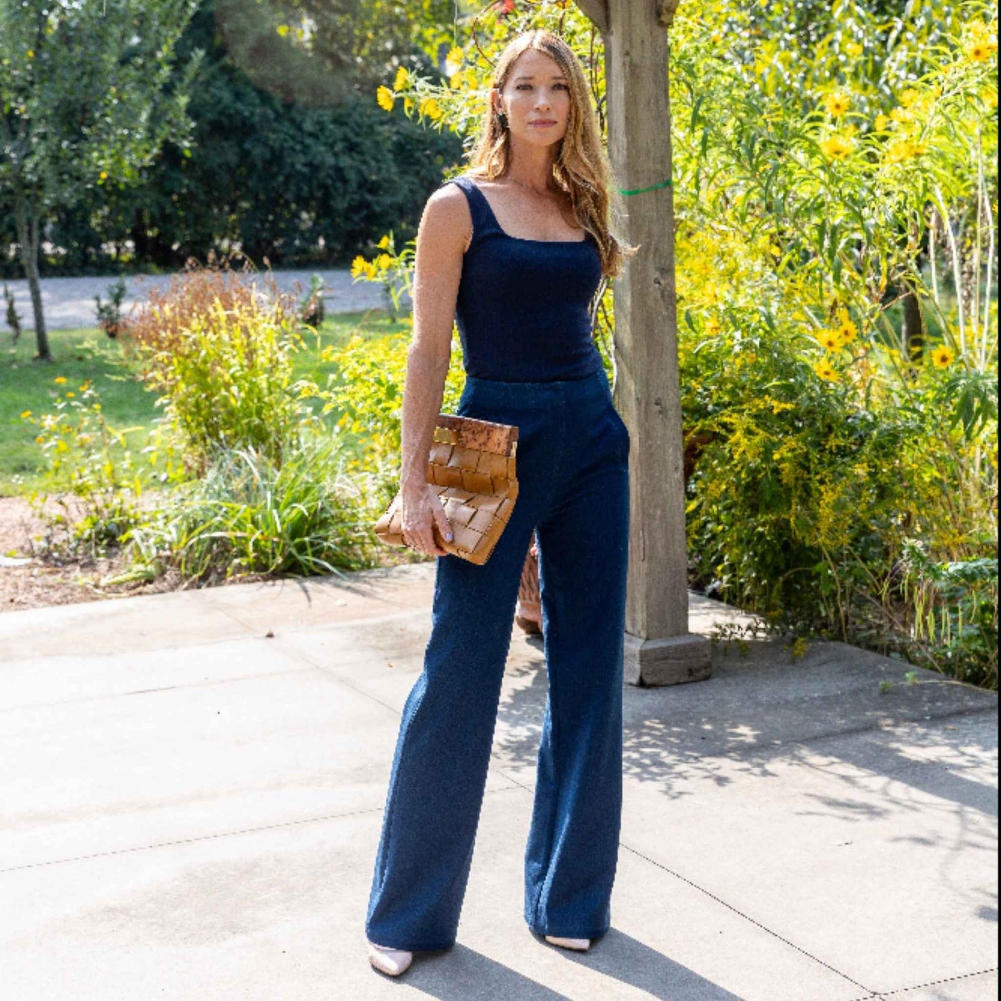 Lifestyle image showing high-waisted flare silhouette