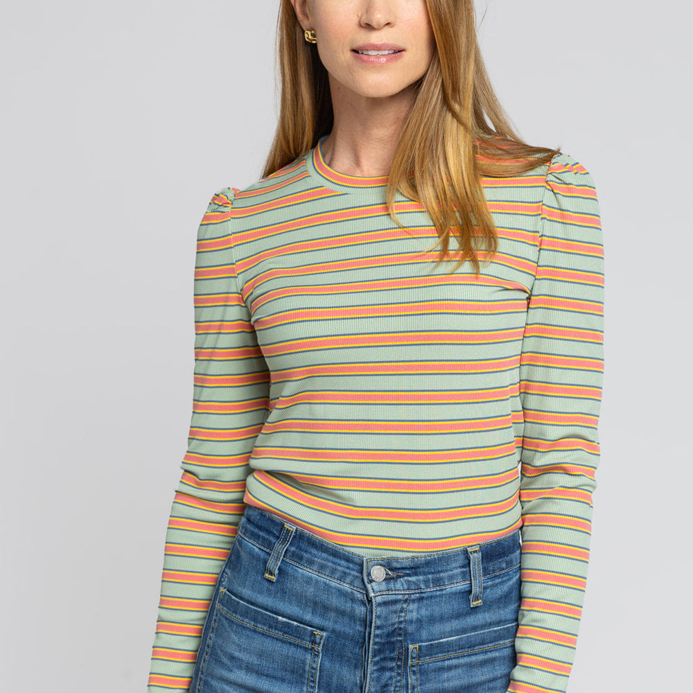
                      
                        Side view of Dylan Striped Knit Top showing subtle puff shoulder detail and lightweight fabric.
                      
                    