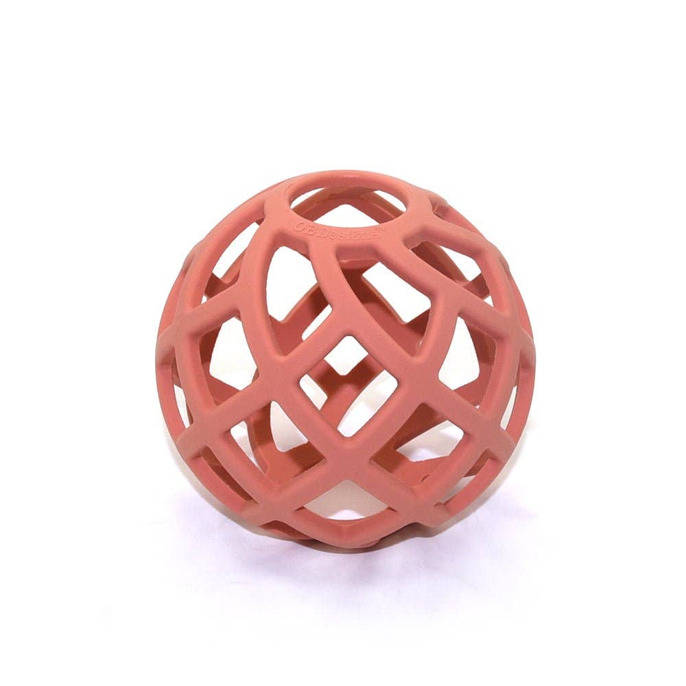 Eco-conscious silicone teether ball in blush pink on white background, designed for babies using non-toxic, food-grade silicone