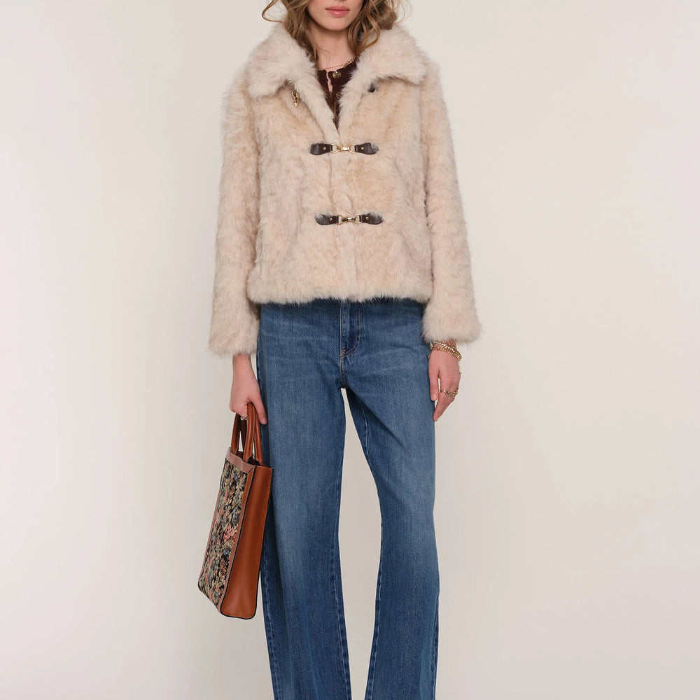 Full-length view of Elsbeth Faux Fur Jacket on model, featuring chic silhouette and versatile layering style.