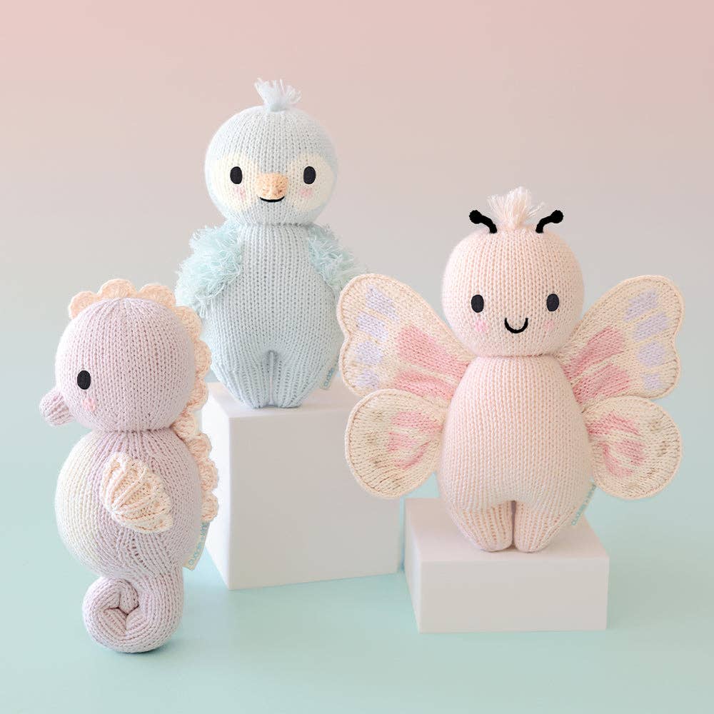 
                      
                        Baby Seahorse (Lilac) – Hand-Knit Collectible Doll | Gives 5 Meals
                      
                    