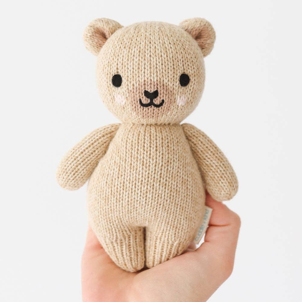 
                      
                        Baby Honey Bear – Hand-Knit Stuffed Animal | Gives 5 Meals
                      
                    