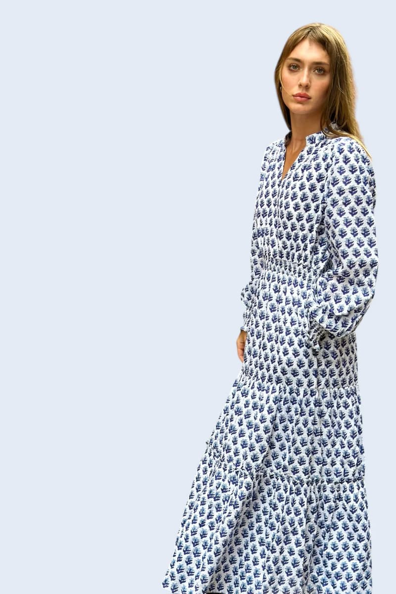 Woman wearing Farylina Dottie Dress in navy, blue & white hand-blocked floral.