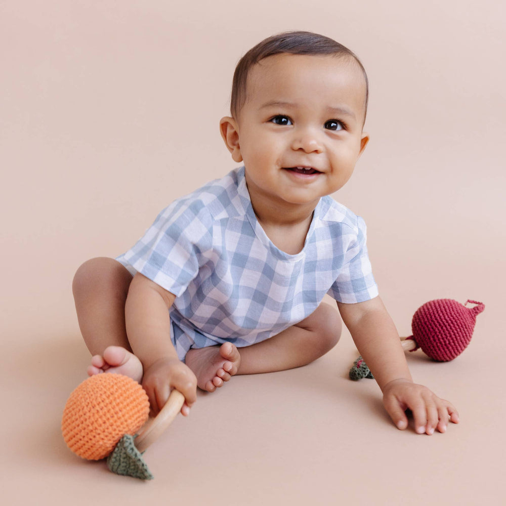 
                      
                        Cotton Crochet Rattle Fruit Orange Baby Teether – Clementine by The Blueberry Hill
                      
                    