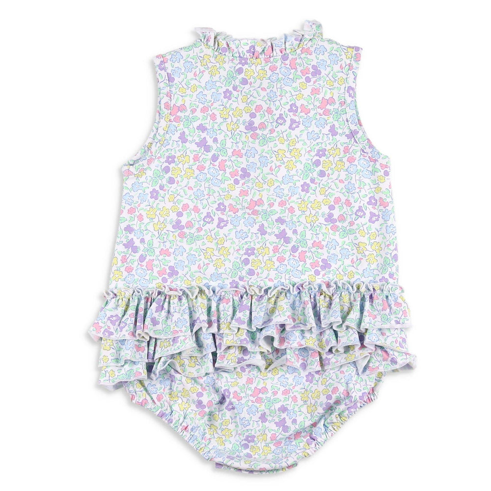 
                      
                        Back flat lay of the Kiawah Ruffle Bubble showing three layers of back ruffles and the charming hand-drawn floral and fruit print on white cotton.
                      
                    