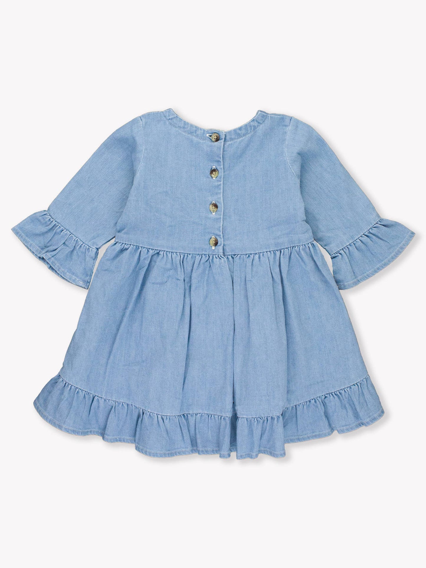 Back flat lay of girls stretch denim ruffle tunic showing back buttons and high-low hem