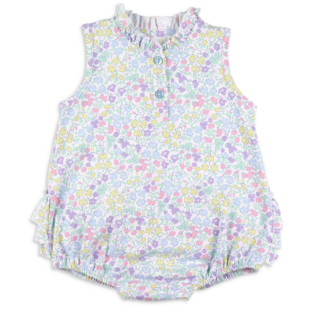 Front flat lay of the Girls Ruffle Bubble – Kiawah by Serendipity, featuring soft cotton knit with a floral and fruit print, ruffle neckline, and custom buttons.