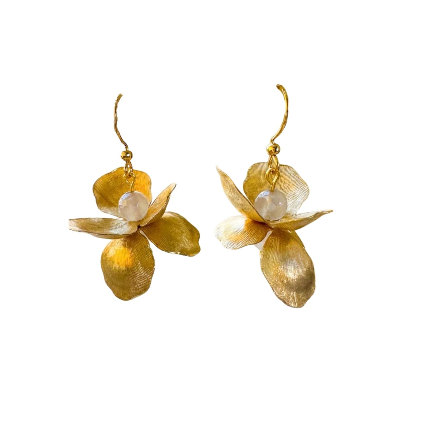 Flatlay view of Golden Petals floral earrings showing movement and texture.