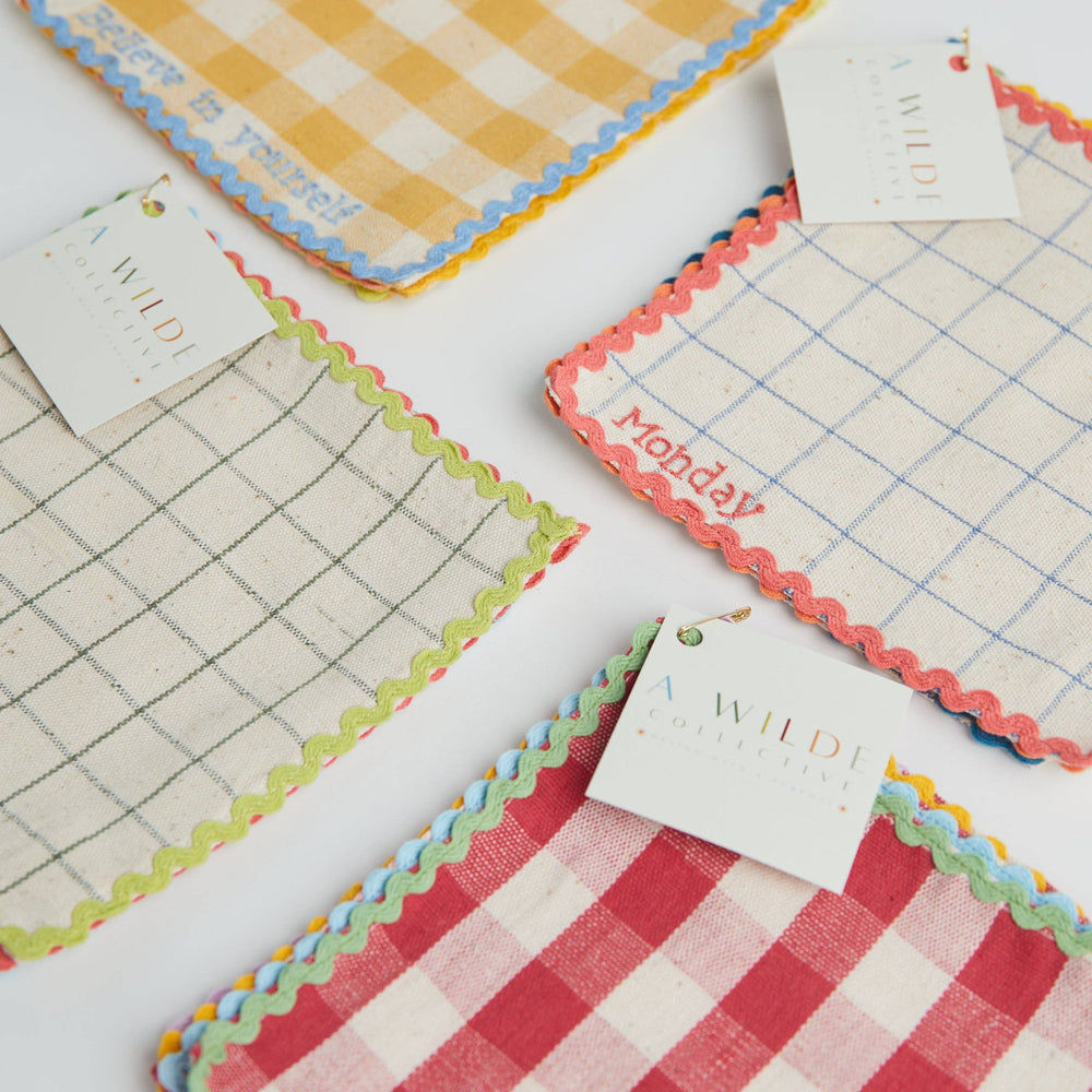 
                      
                        Flat lay of all handwoven lunchbox napkin sets arranged side by side
                      
                    