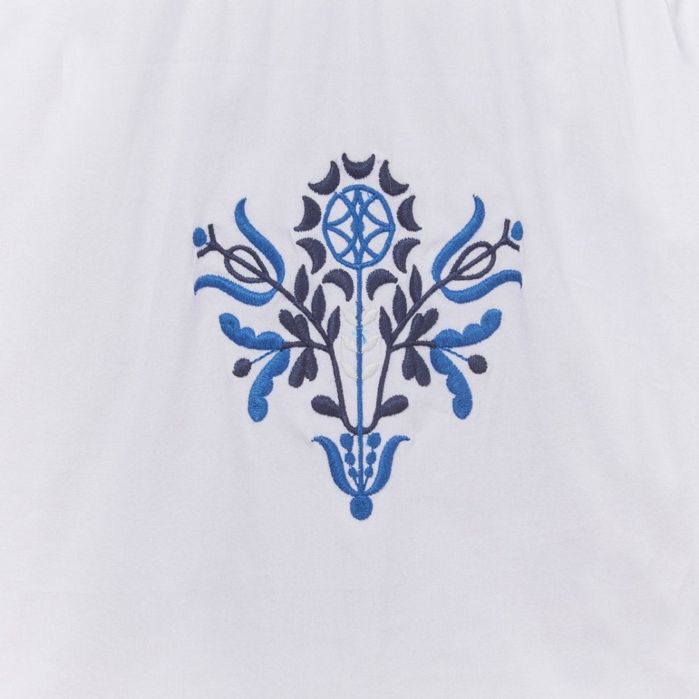 Close-up of embroidered pattern and Americana trim on the Harbor Dress by Ivy Coast