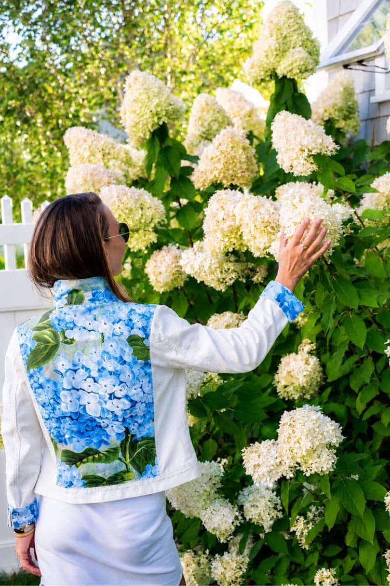 Woman wearing Gather + Goode Hydrangea White Denim Jacket — Grace & Haven, Essex CT