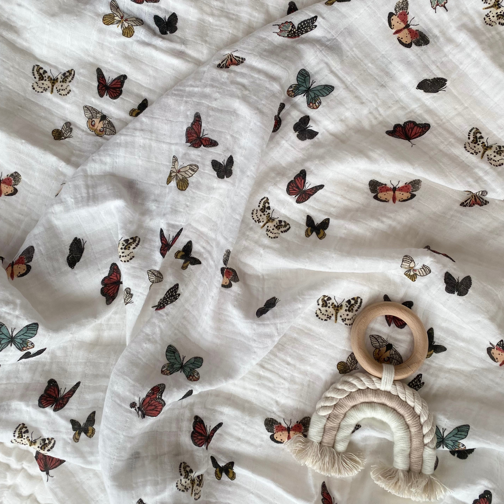 
                      
                        Lexi Butterfly Muslin Swaddle - Grace & Haven
                      
                    