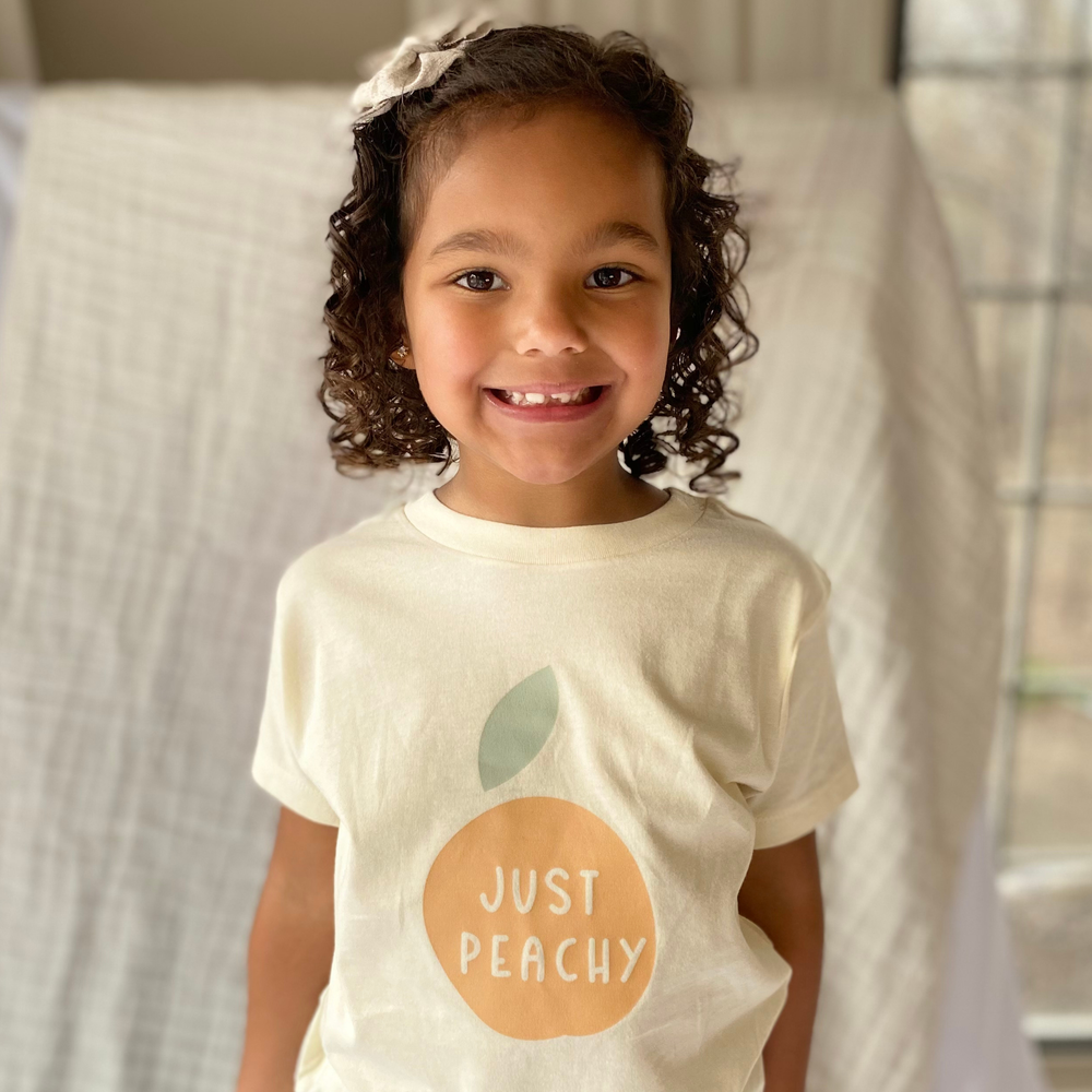 
                      
                        Just Peachy Kids Graphic Tee - Grace & Haven
                      
                    