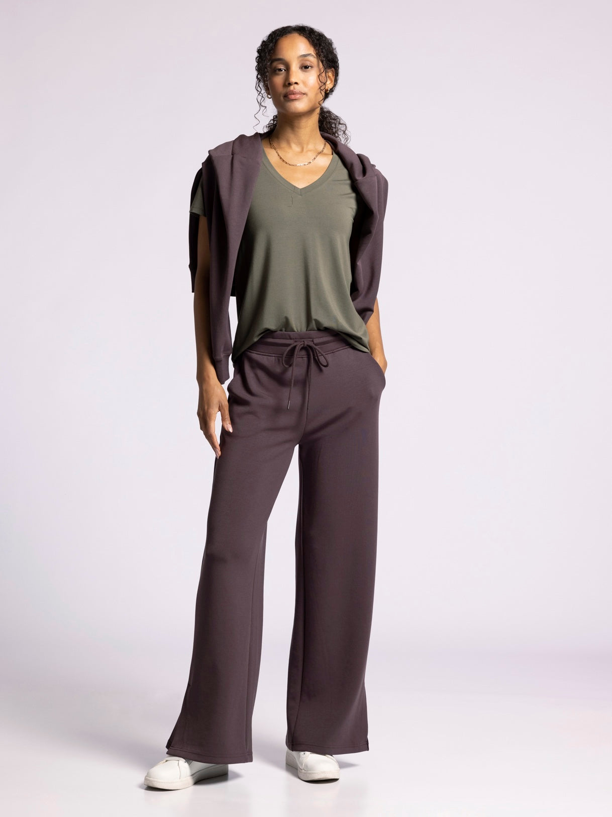 Best-selling Layne Pants in chic plum color, designed for comfort and versatility, perfect for casual outings or lounging in style