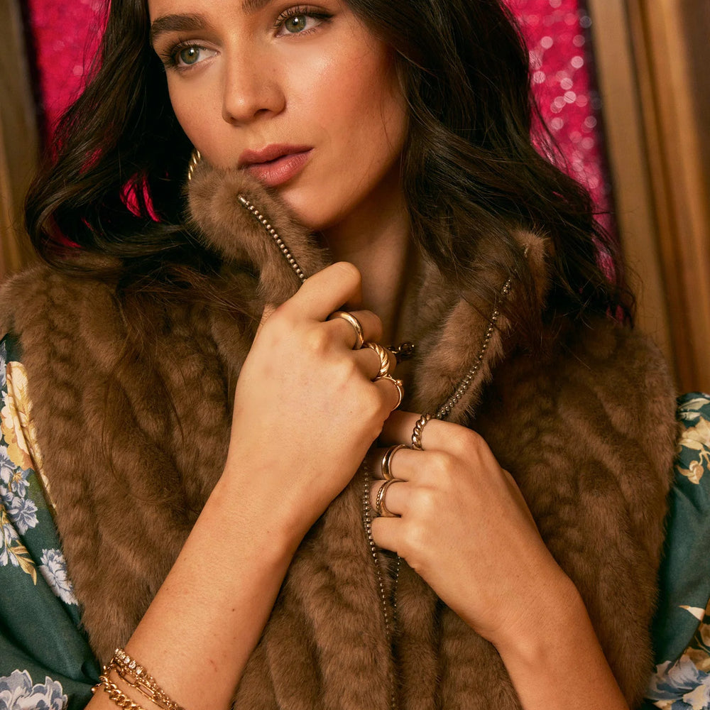 
                      
                        Detailed close-up of The Liana Vest on model, emphasizing soft, cozy fabric and comfortable fit.
                      
                    