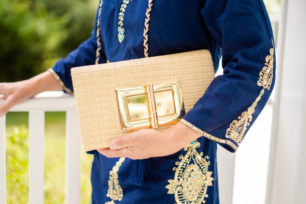 
                      
                        Elegant straw exterior of Lillian Clutch Purse, showcasing sophisticated design for any occasion
                      
                    