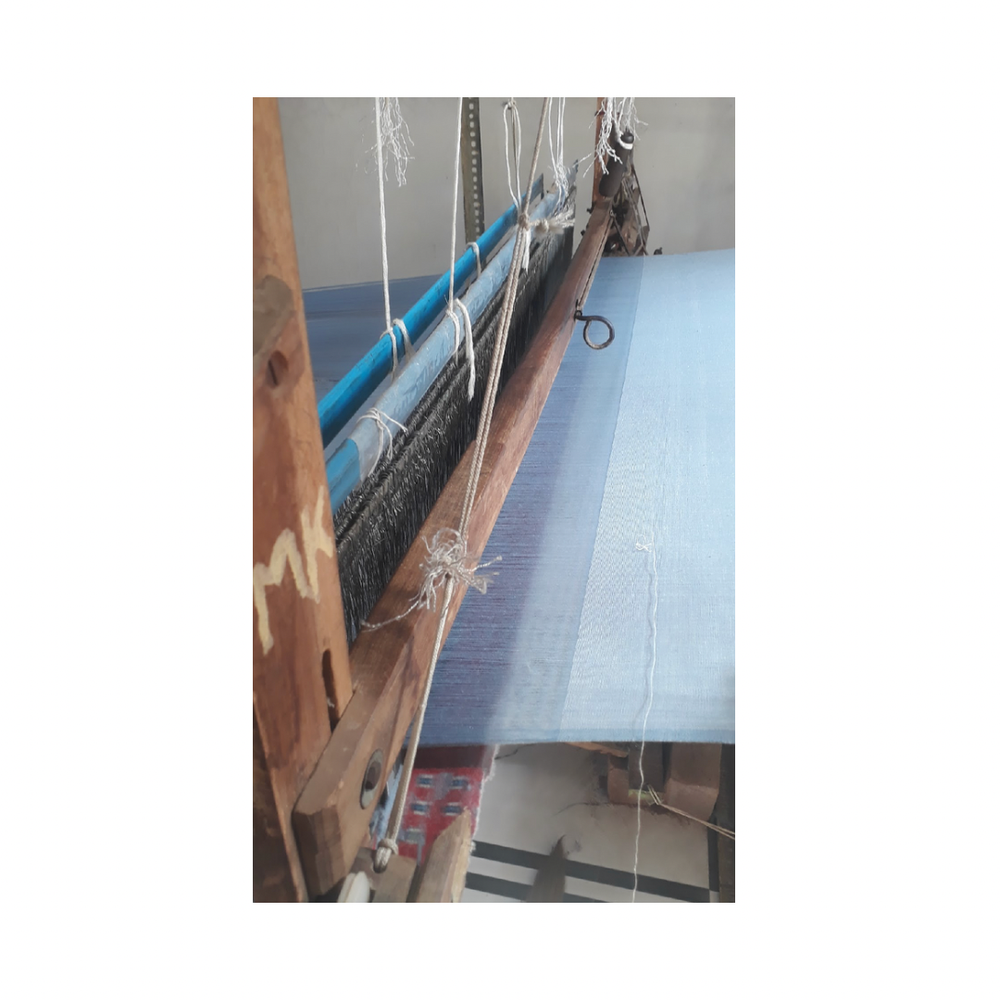 
                      
                        Traditional artisan loom used to weave the striped tooth fairy pillows by hand in India
                      
                    
