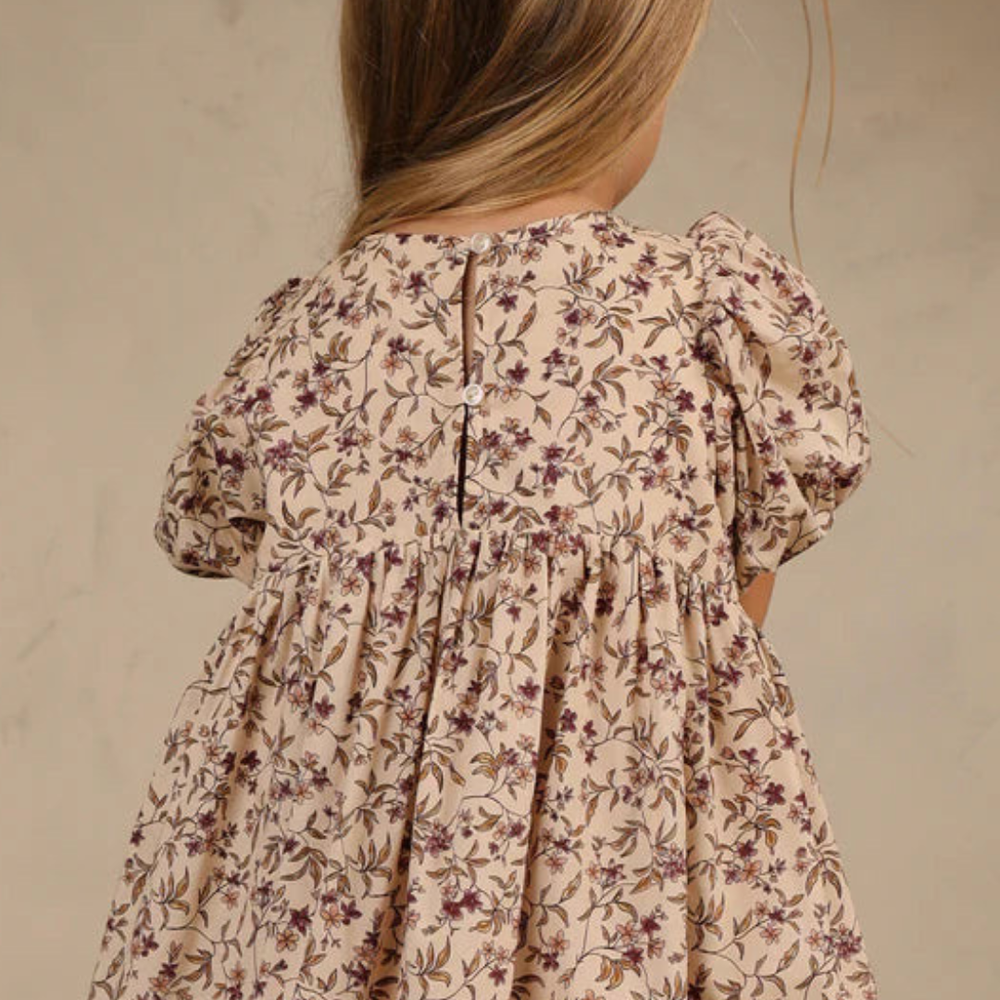 
                      
                        Luna Dress in Fig Floral by Noralee featuring puff sleeves and floral print
                      
                    