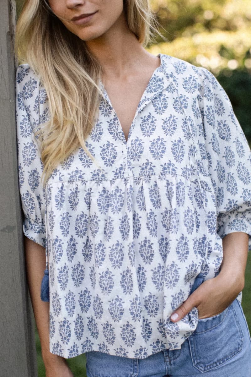 Close-up of Marea Steph Top Ivory/Indigo Meadow hand block print — indigo meadow botanical motif on ivory 100% cotton