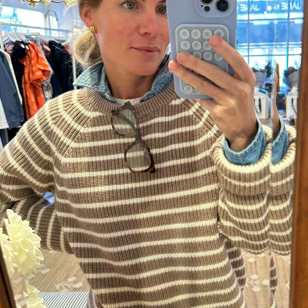
                      
                        Marea Striped Merino Wool Sweater in camel and ivory, showcasing classic crewneck design and cozy shaker stitch texture.
                      
                    