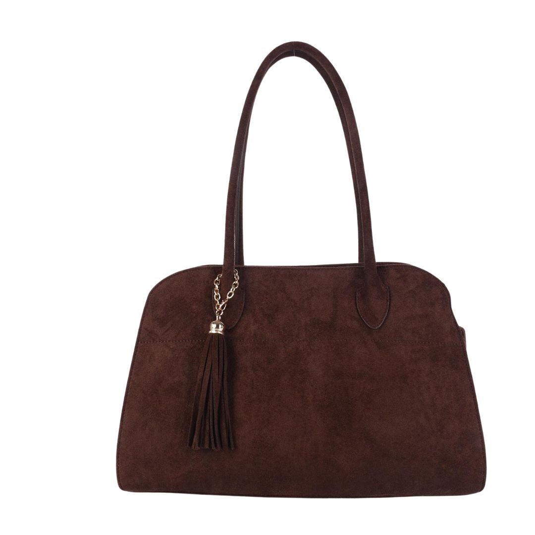 Megan faux suede medicine bag handbag by Lisi Lerch shown in flatlay.