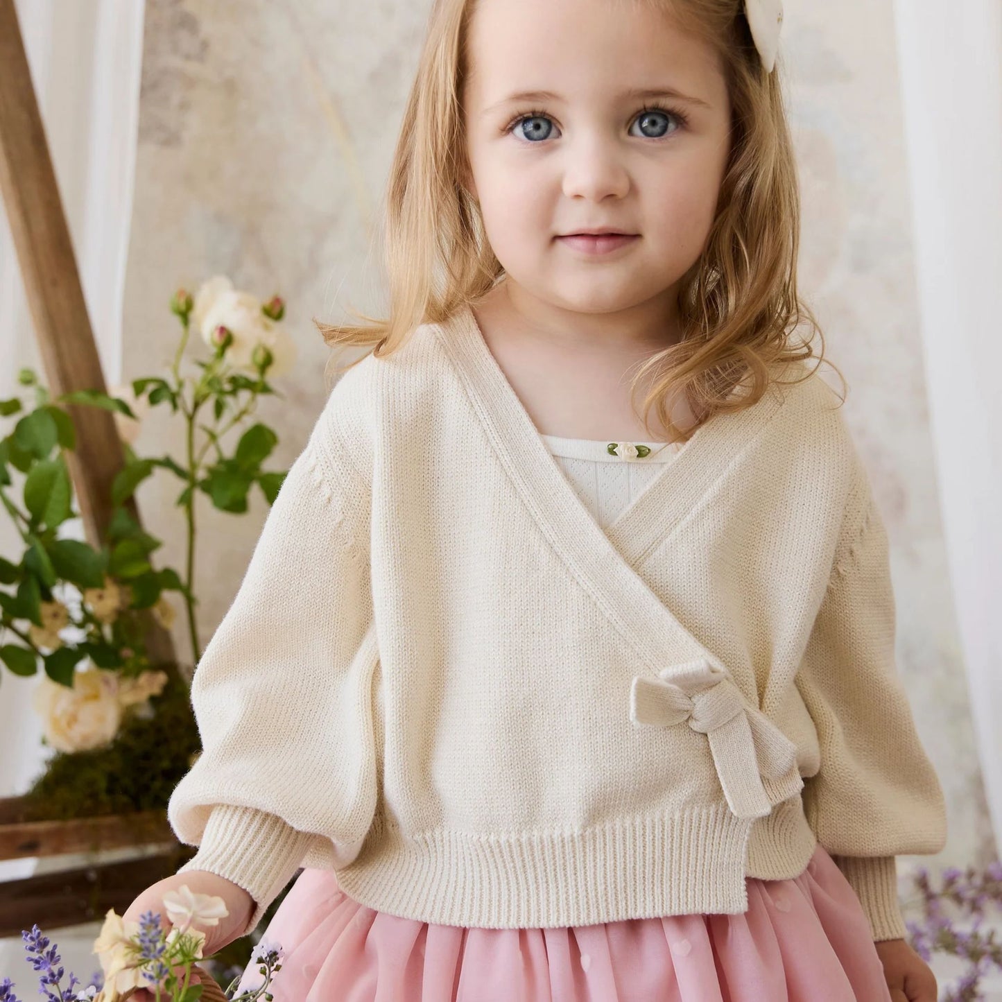 Child wearing Jamie Kay Micheala Sparkle Organic Cotton Cardigan