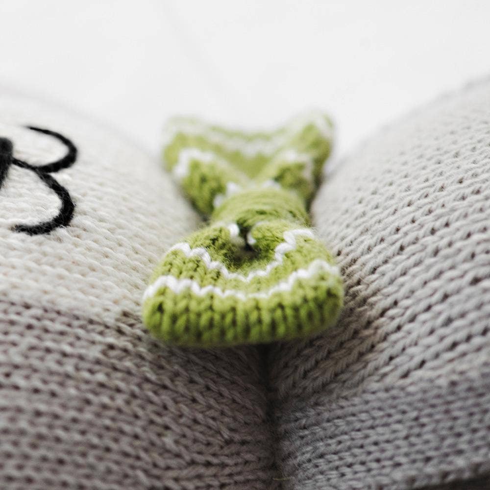 
                      
                        Close-up of Noah the Dog’s hand-knit bowtie, showcasing exquisite craftsmanship and fair trade design.
                      
                    