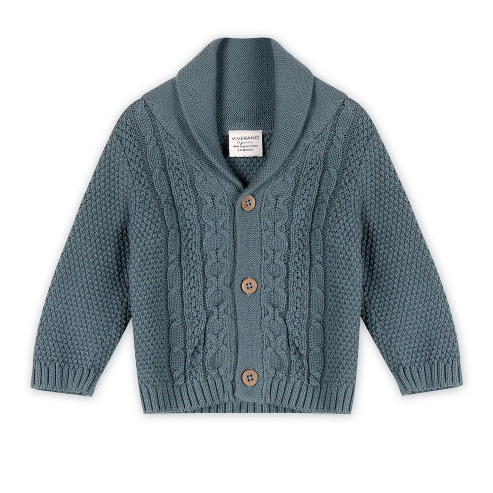 
                      
                        Flatlay of Viverano Organic Cotton Baby Shawl Collar Cable Knit Cardigan in soft natural color
                      
                    